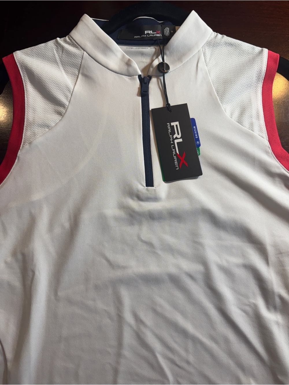 RLX Ralph Lauren Women’s Sleeveless White Performance Polo with Red Trim